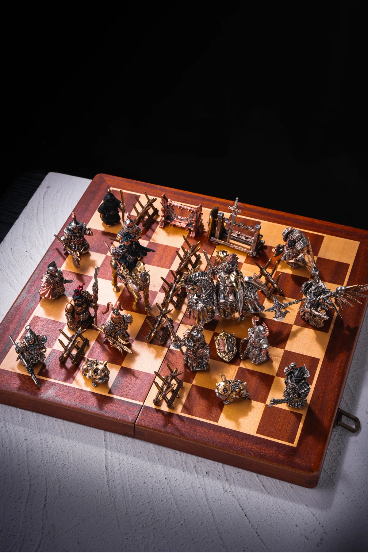 Magnetic metal figures arranged on a chessboard