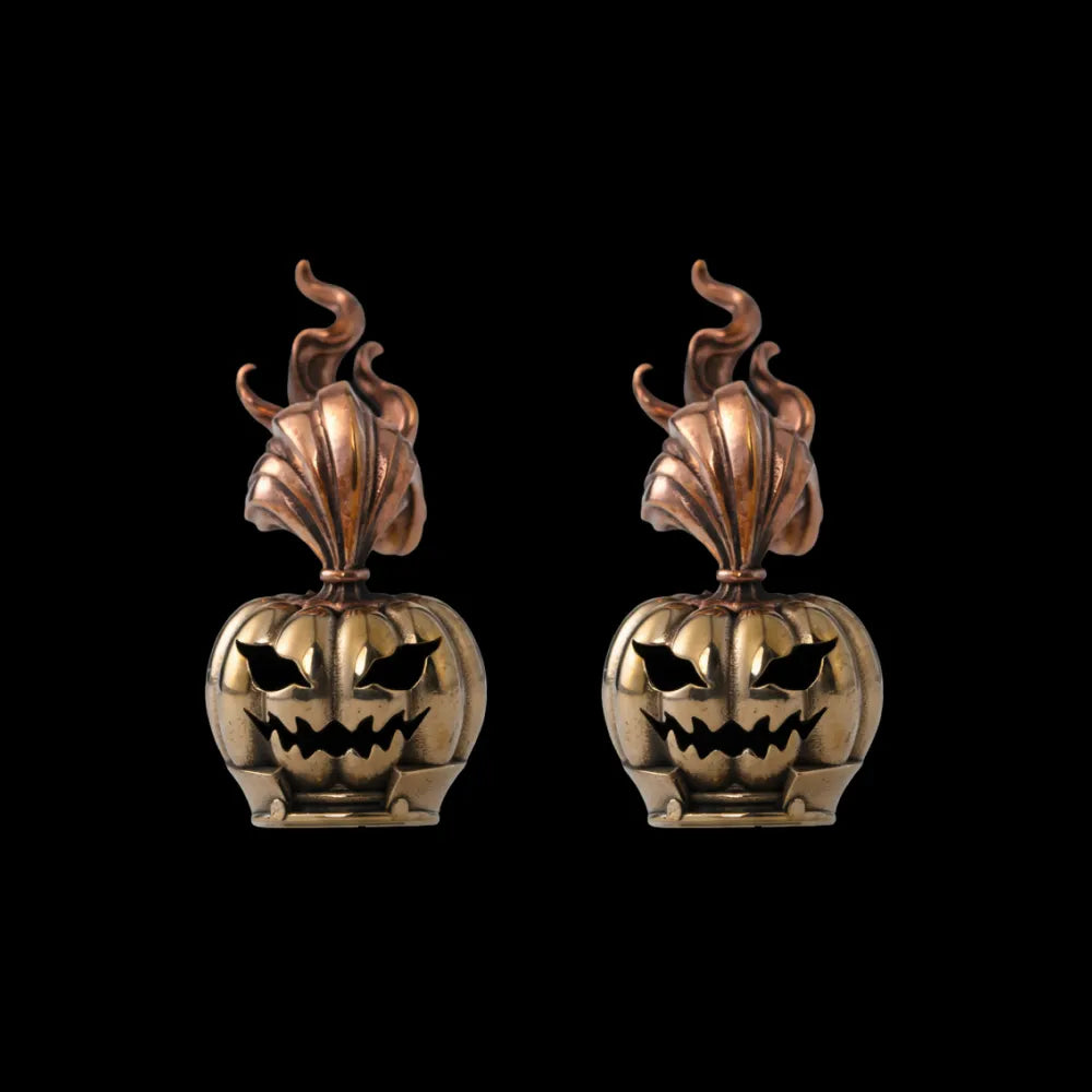 Two pumpkin heads against a black background
