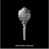 Xiezhi War Hammer with a sculpted circular head against black