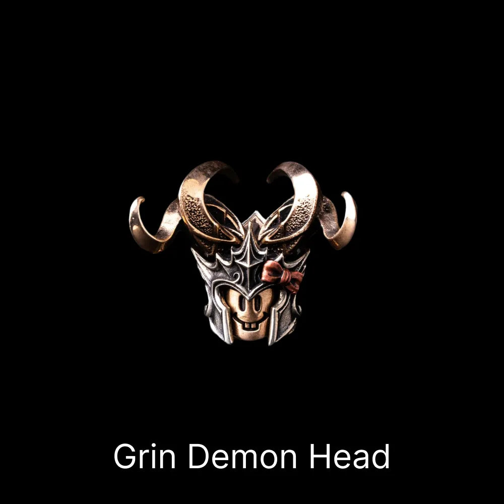 Grin Demon Head in Bronze, White Bronze and Copper - main view