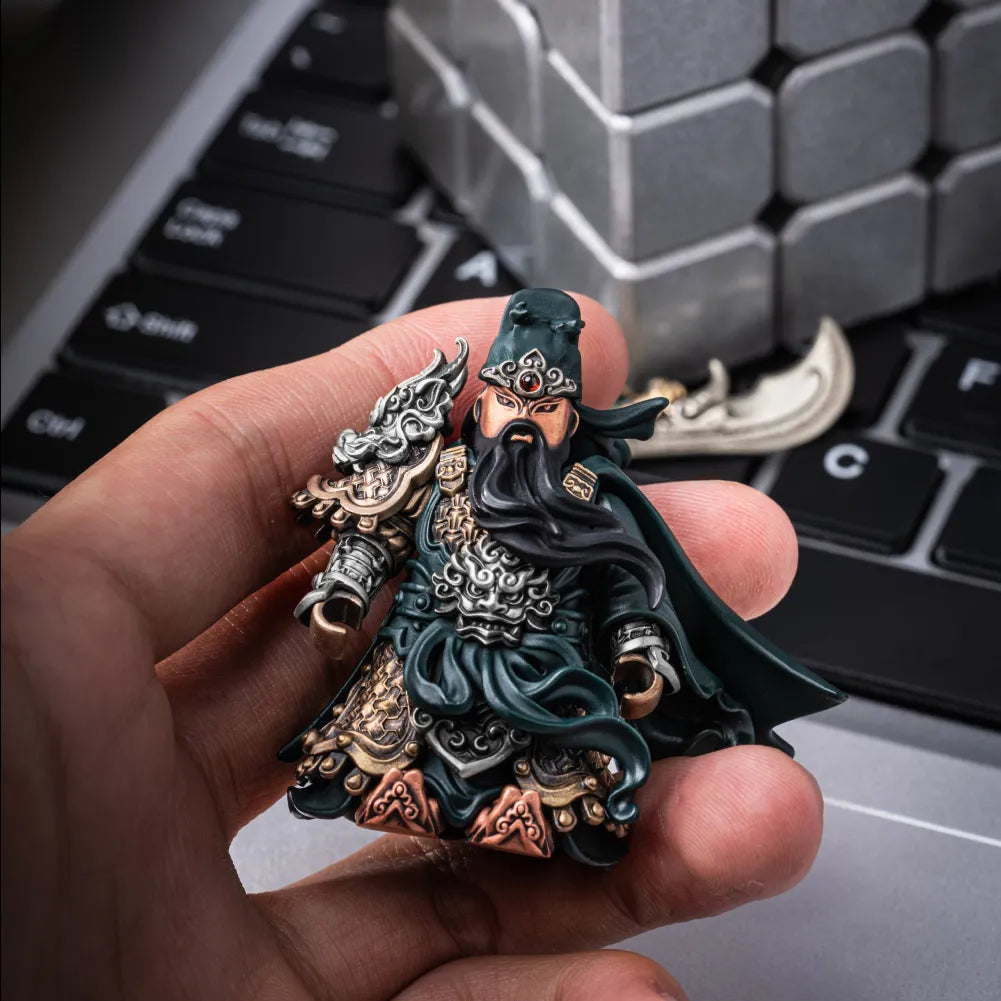 Guan Yu figure held in a hand