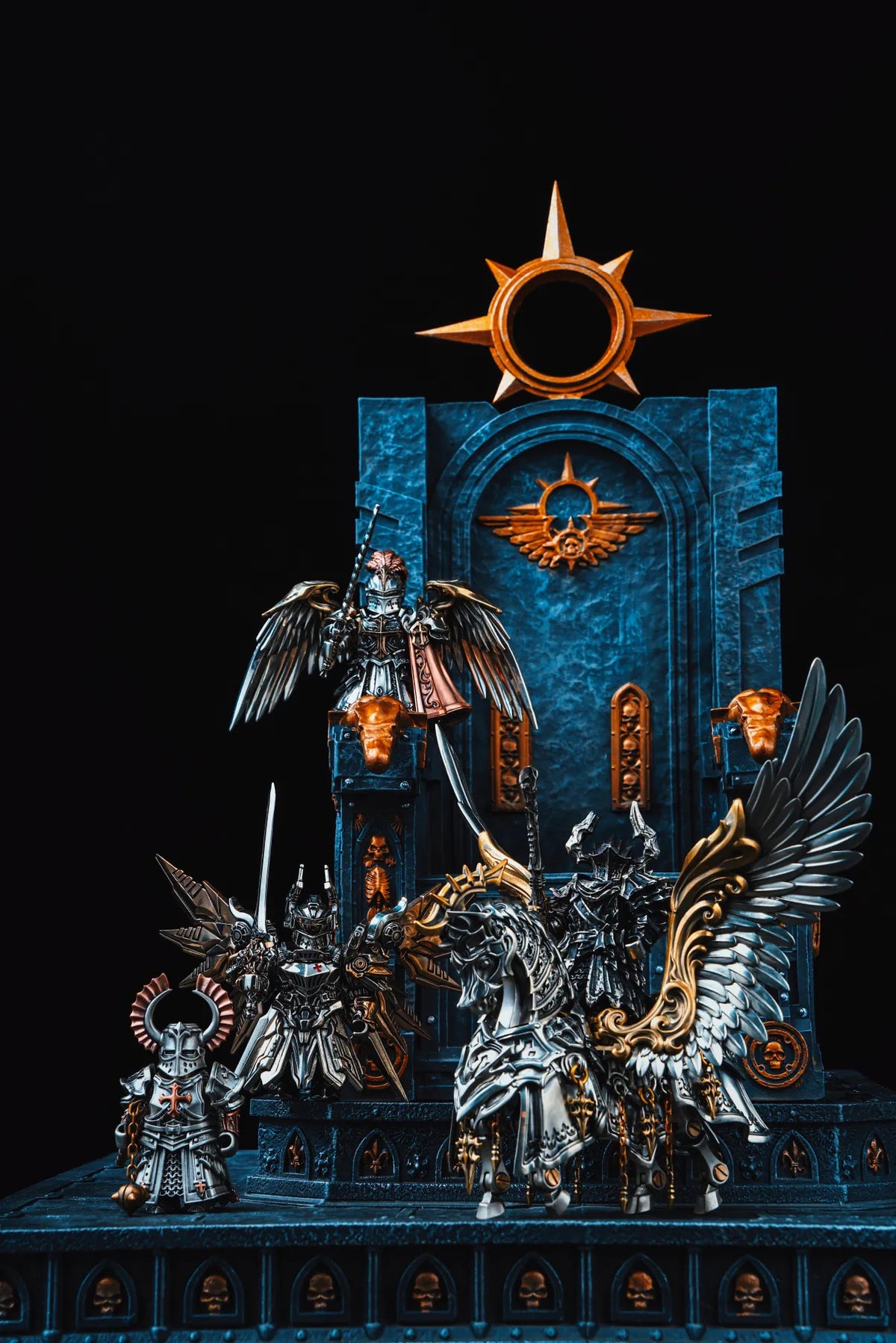 IRONDOM warrior collection on a blue display stand