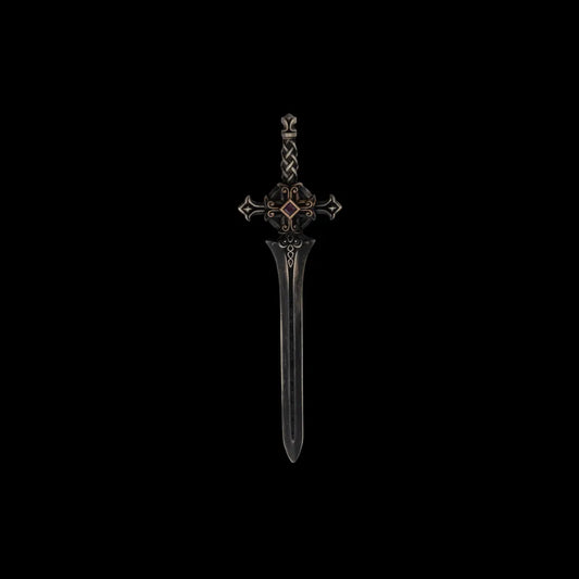Dark miniature sword with an ornate crossguard on a black background