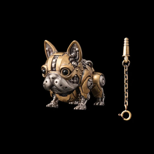 One gold-tone and silver-tone mechanical dog figure beside a small key on a chain.