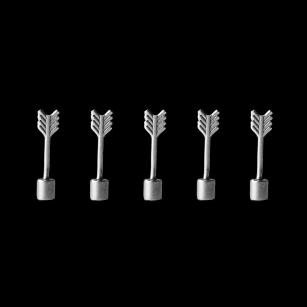 Five miniature arrows against a black background