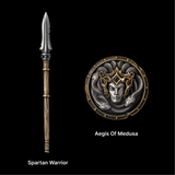 Miniature spear and round Medusa shield on a black background