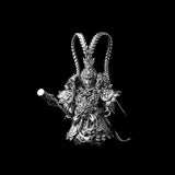 Wukong figure holding a staff against black
