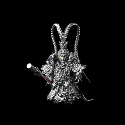 Wukong figure holding a staff against black