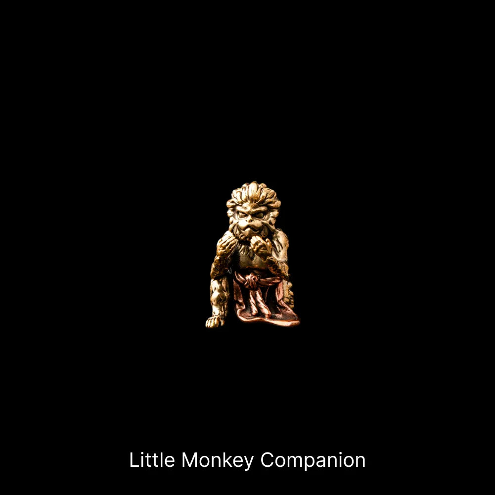 Small monkey companion figure against a black background
