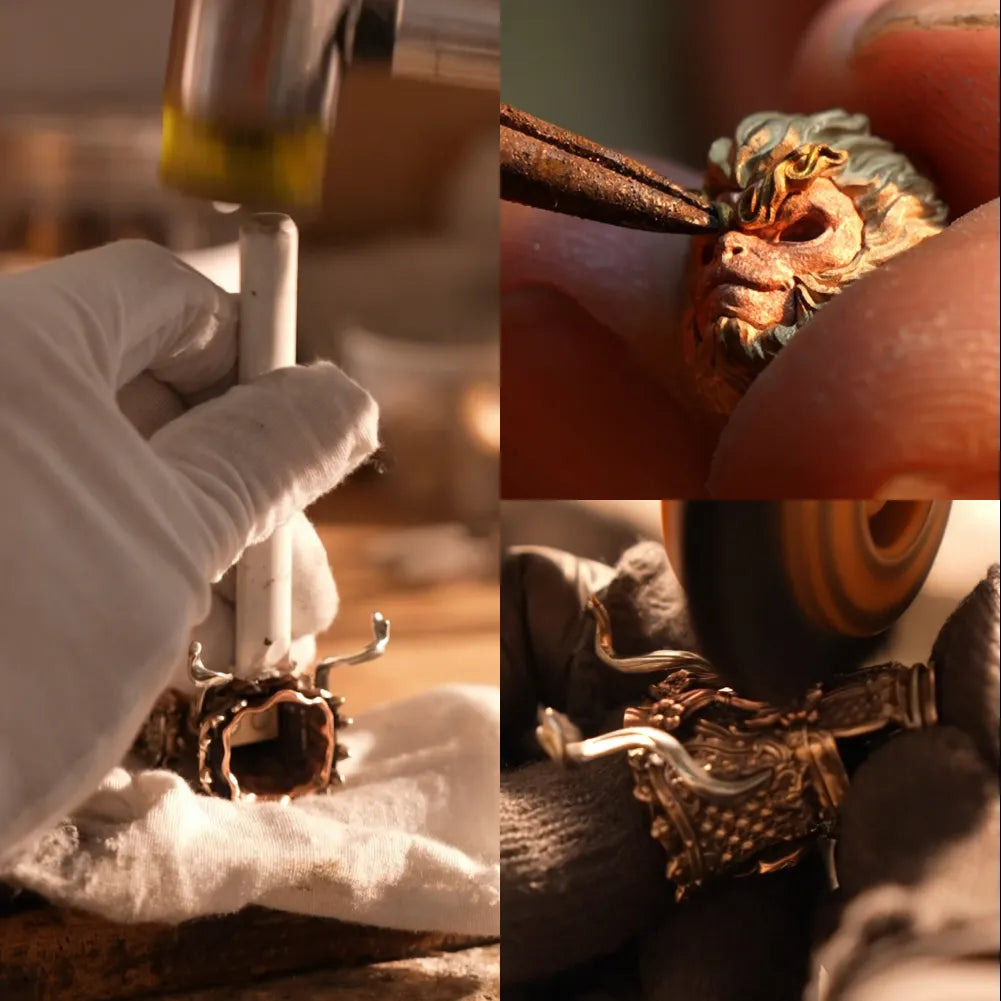 Hands working on a Wukong figure head and components