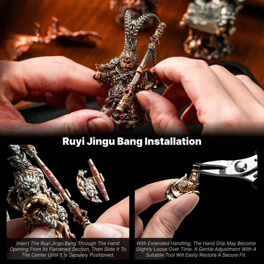Hands attaching a staff to a Wukong figure